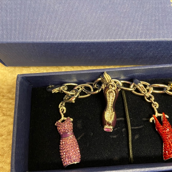 Stunning Swarovski charm bracelet. Dresses and shoes charms! Brand new - Picture 2 of 9